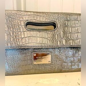 Nine West silver clutch with  free bonus no brand silver wallet. Clutch in EUC.